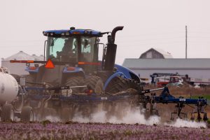 Matthew Backer spreads anhydrous ammonia onto a field on April 4 at Wise Bros Inc. in Kingdom City, Mo. Photo by Kate Cassady