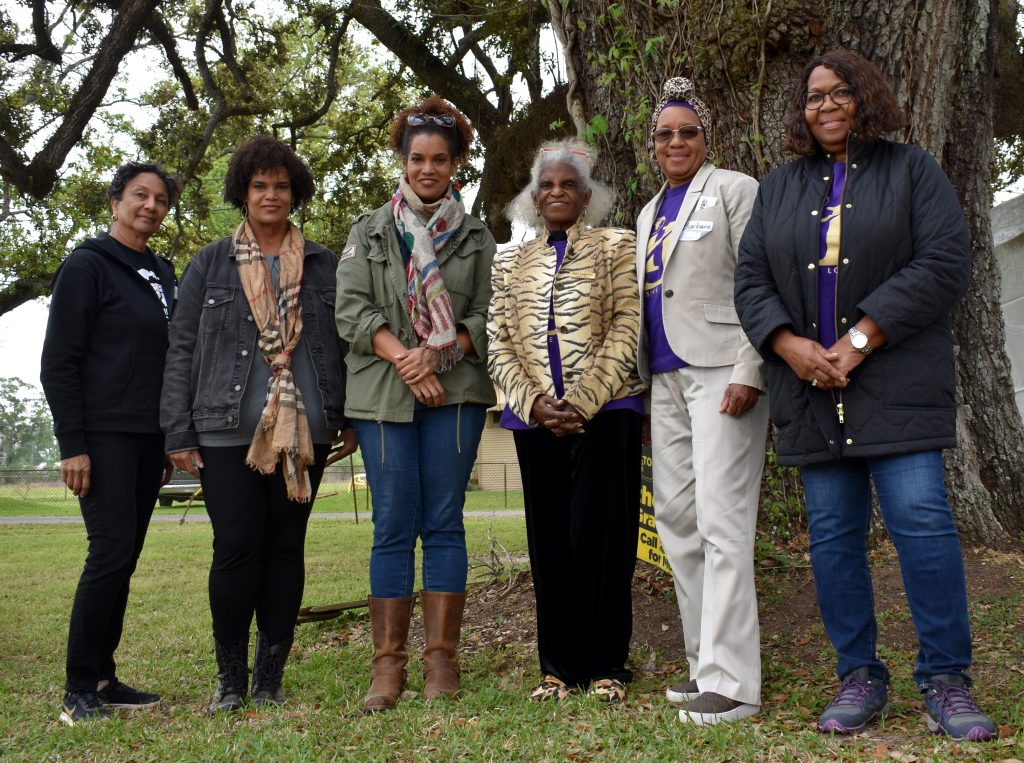Environmental justice leaders Stephenie Aubert, Jo Banner, Joy Banner, Gail LeBoeuf, Barbara Washington and Myrtle Felton pose for a portrait in Wallace, Louisiana, on March 13, 2023. Photo by Lauren Whiddon/WUFT News
