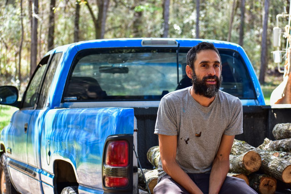 Daniel Robleto, 40, at Nicoya Farms Feb. 22, 2023 He owns the organic farm in southeast Gainesville with his wife, Aviva Asher. (Fernando Figueroa/WUFT News)

