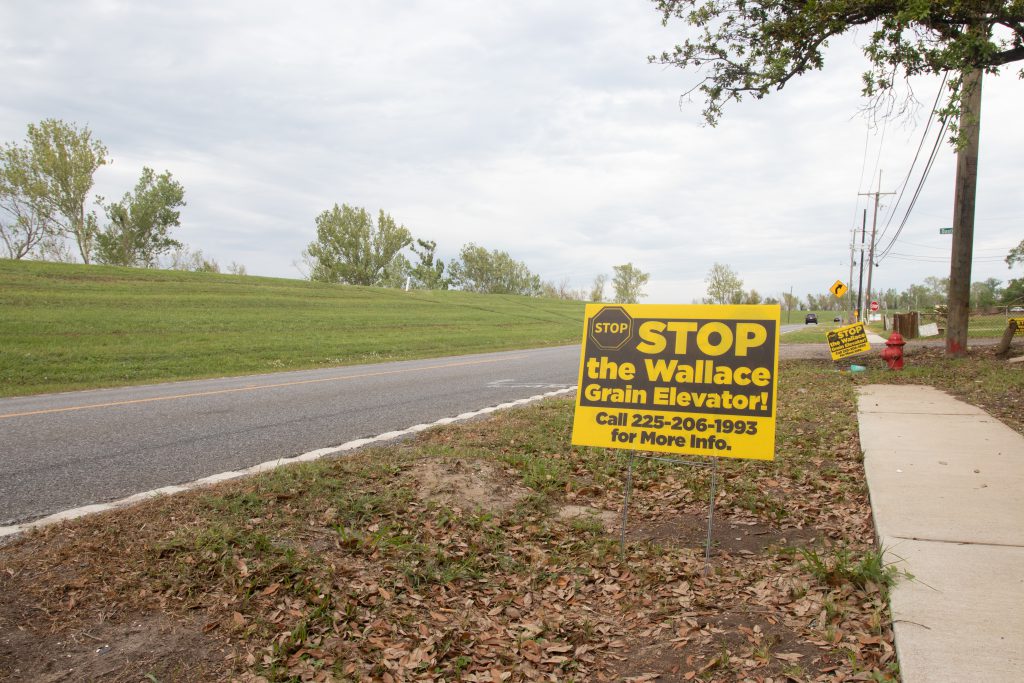 A sign that advocates against Greenfield LLC’s proposed grain elevator sits by the roadside in Wallace, Louisiana, stands on a roadside on March 14, 2023. Photo by Josie Heimsoth 
