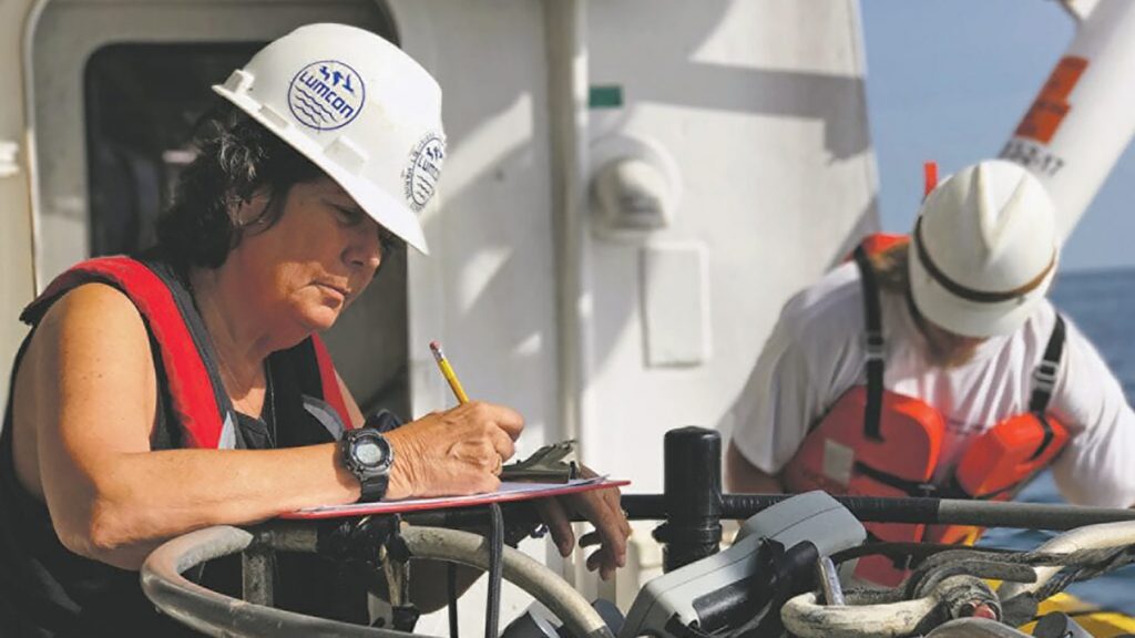 Nancy Rabalais records data during a cruise aboard the R/V Pelican in the Gulf of Mexico in 2017. Photo courtesy of Louisiana Universities Marine Consortium via National Oceanic and Atmospheric Administration