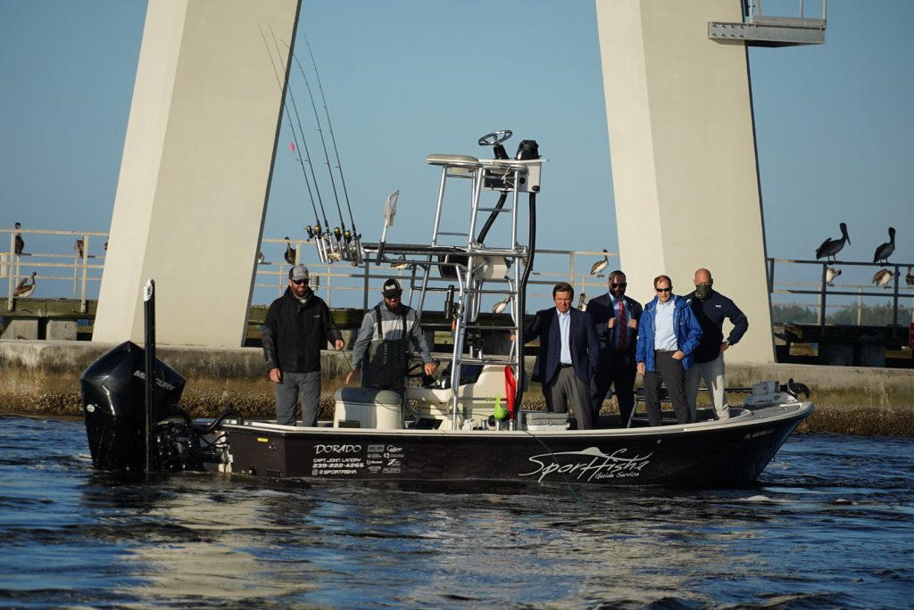 Gov. Ron DeSantis checks out water quality with fishermen in December 2020. Environmental groups have asked the governor to veto an IFAS budget line-item that would also ban local fertilizer ordinances and a road-building demonstration project bill, both supported by the fertilizer industry. (Courtesy Florida Governor’s Office)
