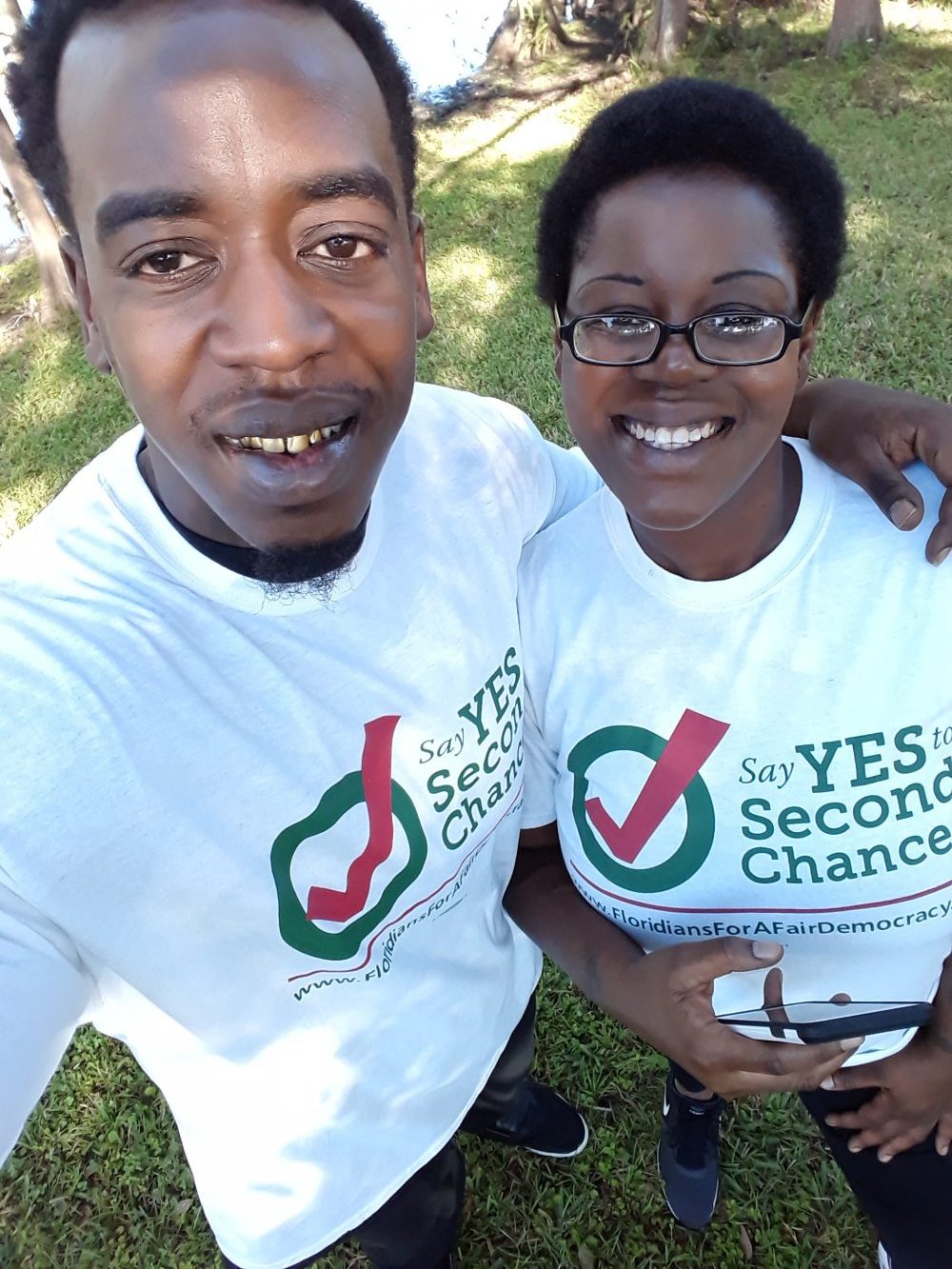 Jhody and her brother Julius smile for a selfie during a Say Yes to Second Chances event. They discussed the struggles they each faced after prison while gathering petitions for an amendment that would restore voting rights to nonviolent felons. (photo courtesy of Julius Irving)