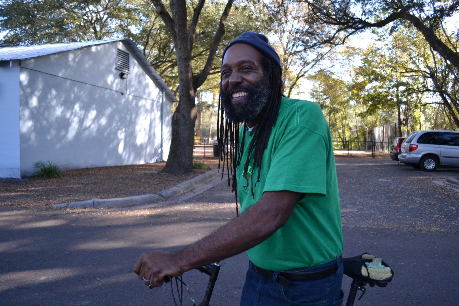 Greater Duval Neighborhood Association representative Andrew Miles appreciates bicycling as his main mode of transportation. It's quick, dependable, cheap and good for the environment. It also helps keep him fit and trim. A member of the Greater Duval Neighborhood Association, he'd like to see bus service extended for those who rely on it. Photo by Monica Humphries.