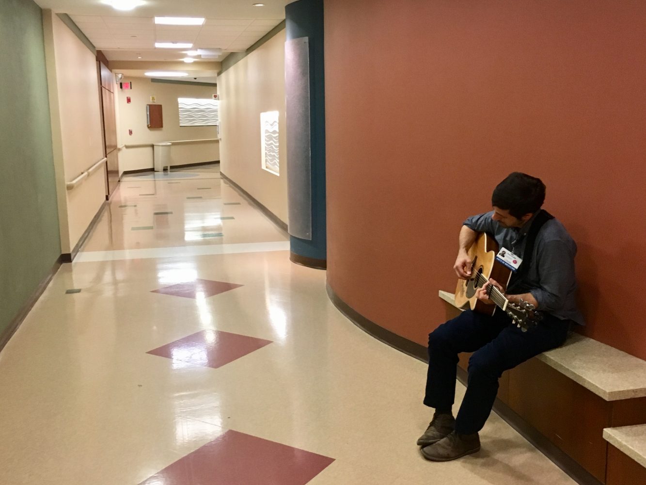 Kendall performs in one of the hospital tunnels on the UF Health campus. (Meredith Sheldon/WUFT News).