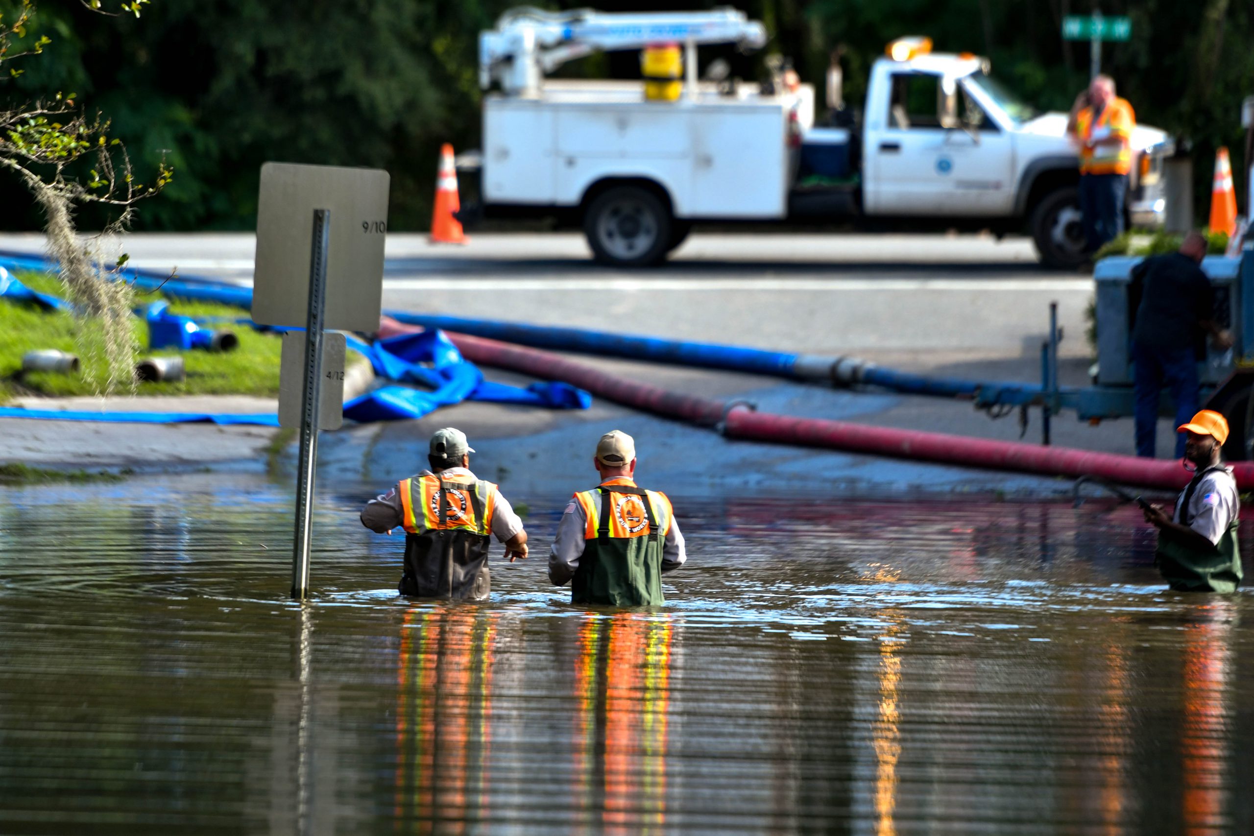 The storm surge from a nearby retention pond brought several inches of water into the home of Wendy Sheehan. The water rose above the baseboards, ruining everything in its wake including the flooring, furniture and drywall. More than 24 hours after the storm, water still splashed as neighbors and family walked across the debris-soaked carpet. Many of the Robin Lane neighborhood residents are wondering why the Sheehan home flooded.
