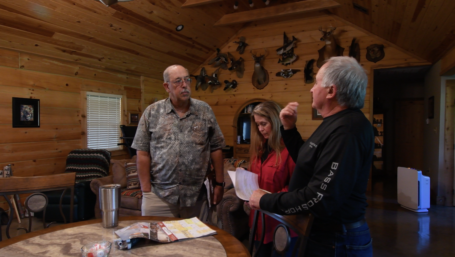 From left: Retired Lt. Gen. Russel L. Honoré talks with Genie and Gene LeBlanc about the problems they are having from the landfill next door. Honoré visits different Cancer Alley residents to see how he can help. (Photo/Grace King)