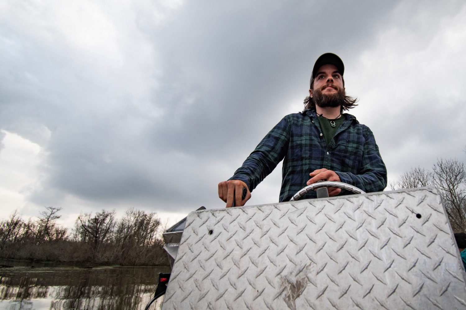 Al Wilson boats through the swamp. He makes his living from Louisiana's natural resources. (Photo/Grace King)